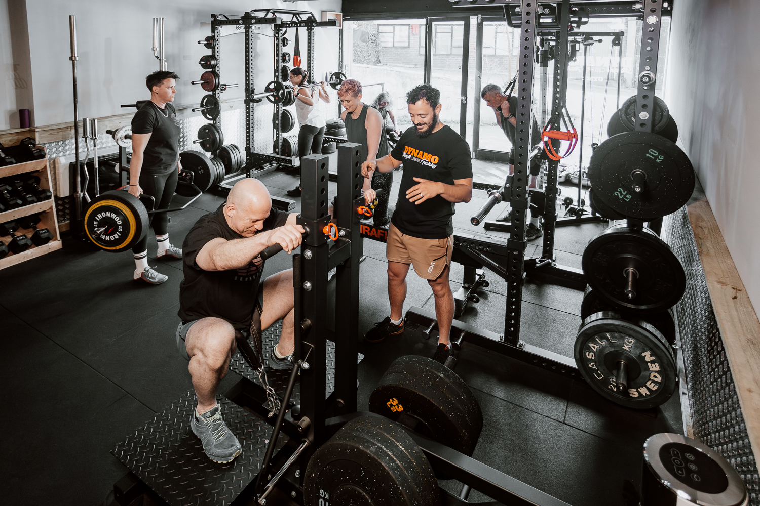 Strength training portrait with gym equipment