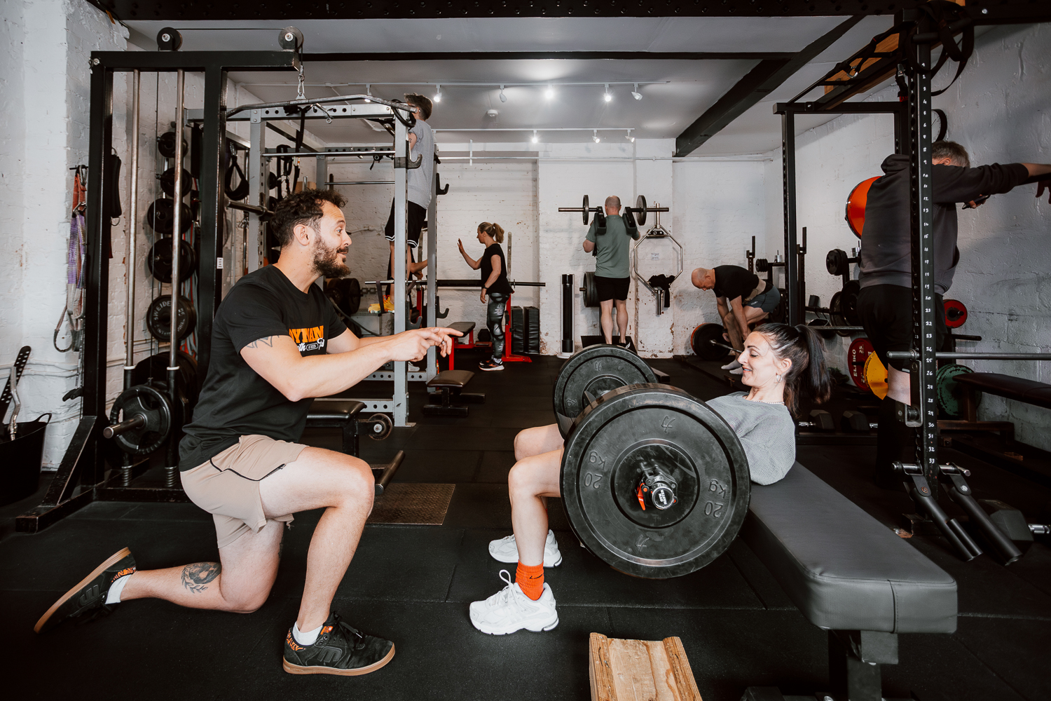 Welcoming gym atmosphere with client participation