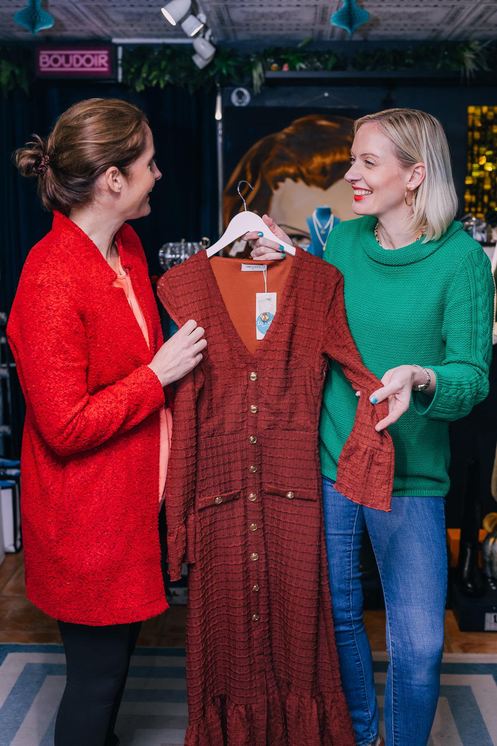 Michaela supporting a client through styling choices