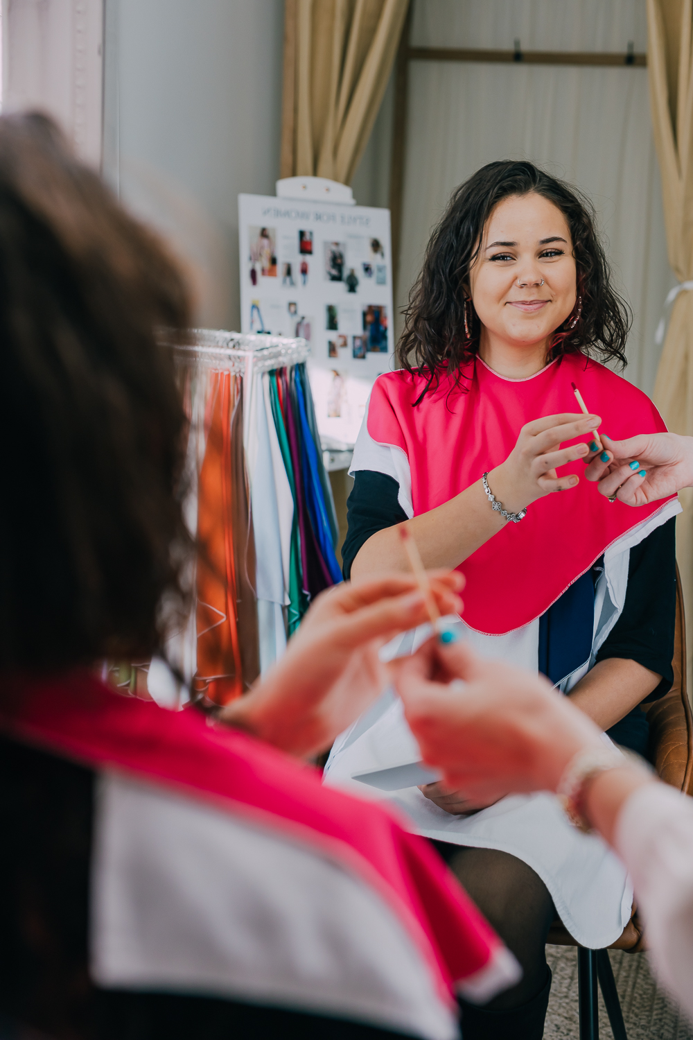 A personal branding client being prepared in the studio