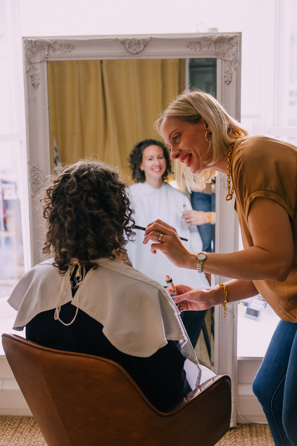 A photographer guiding a branding client
