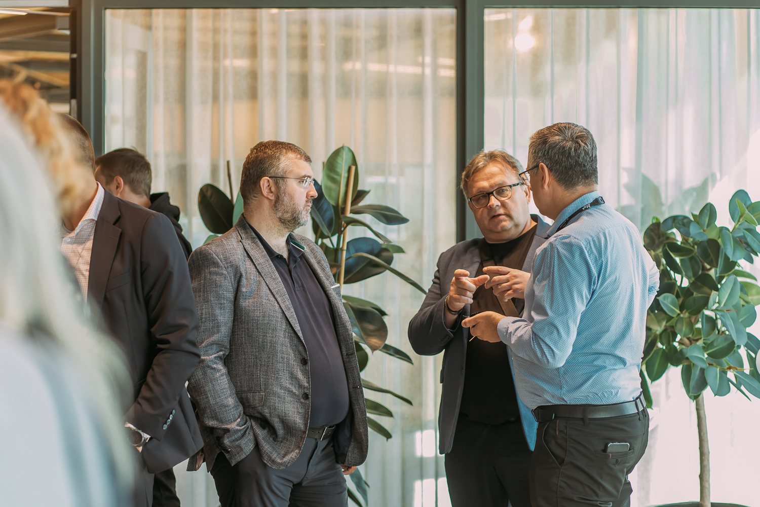 Networking conversation between attendees