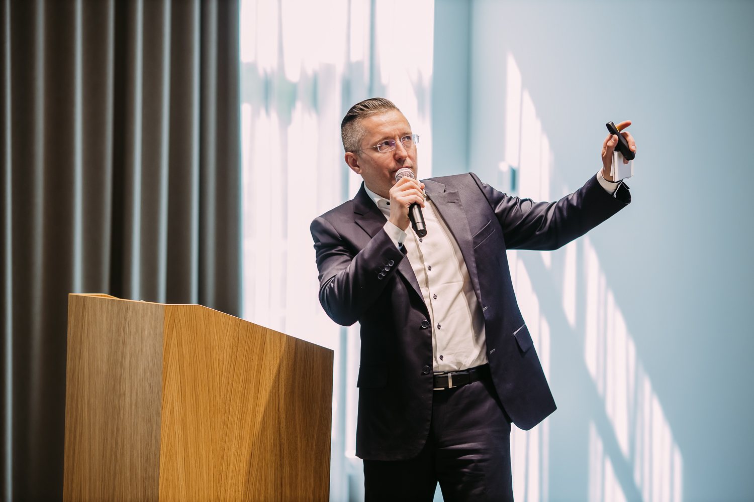 Presenter speaking at a business event