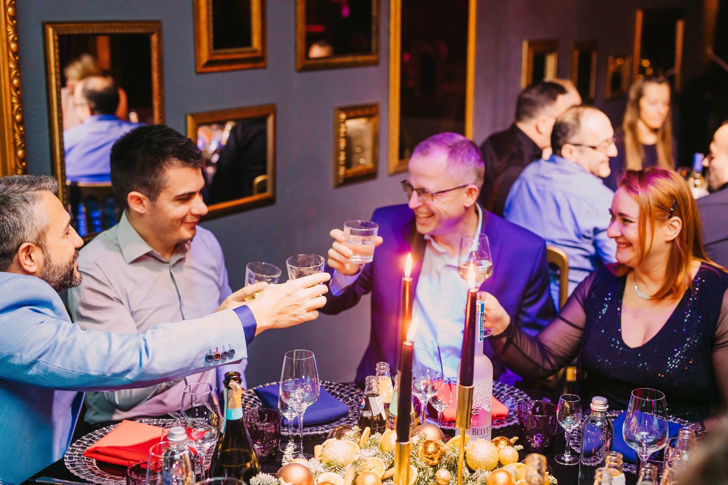 Warm private-event atmosphere around the tables