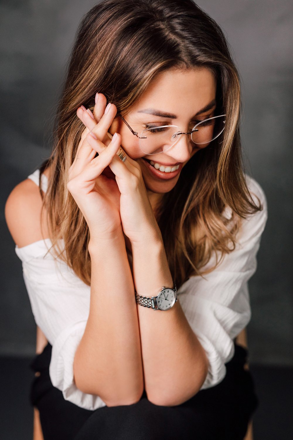 Smiling personal brand portrait with glasses
