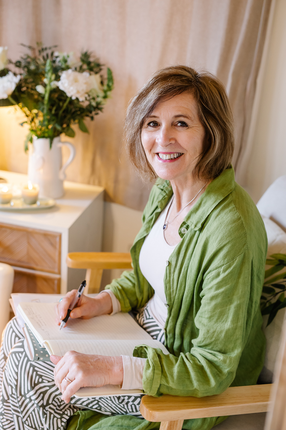 Founder portrait in a bright studio corner