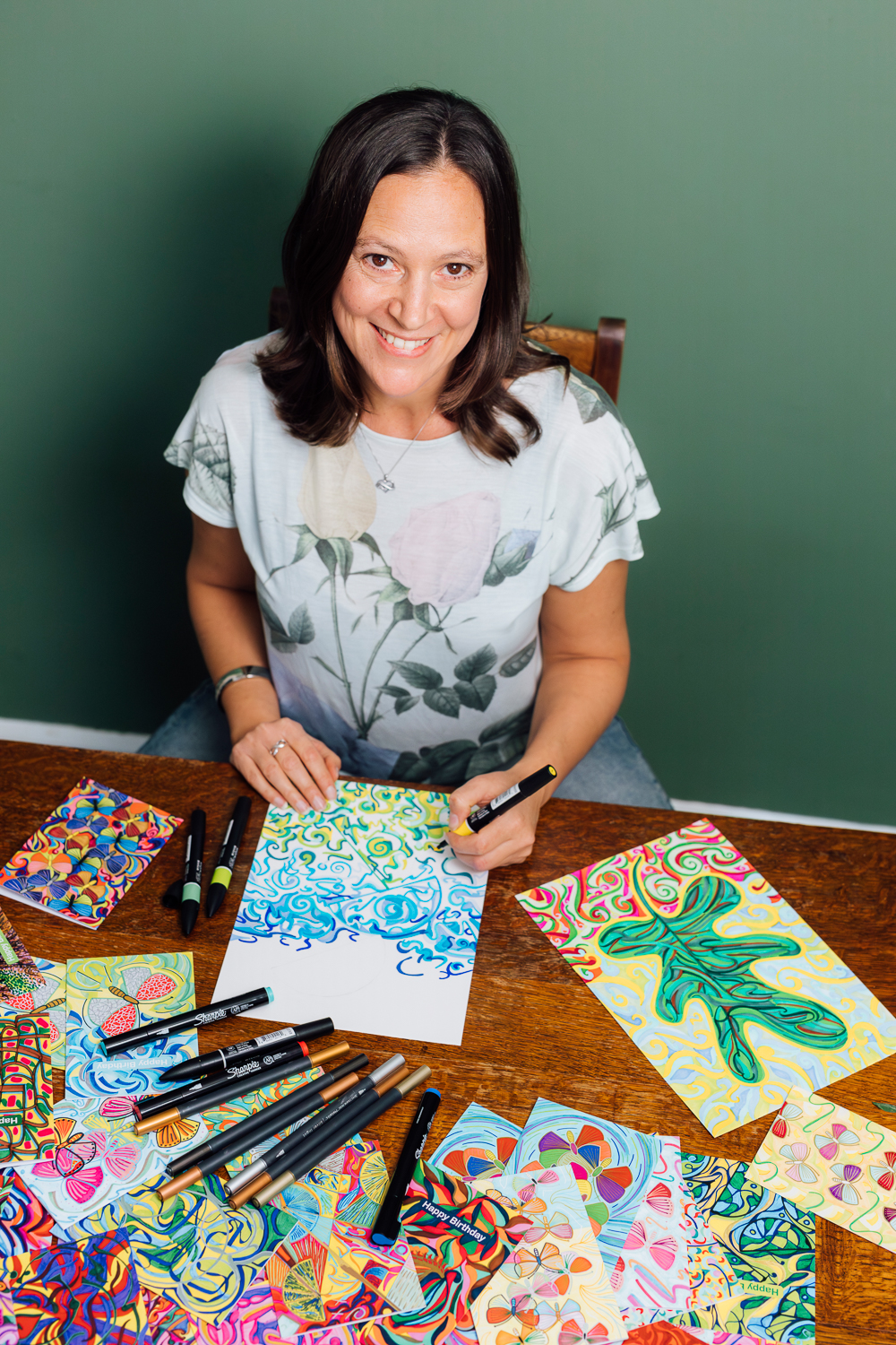 Founder portrait with art-led workspace details