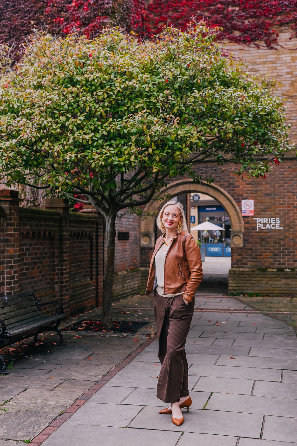 Outdoor portrait in a street setting with autumn tones