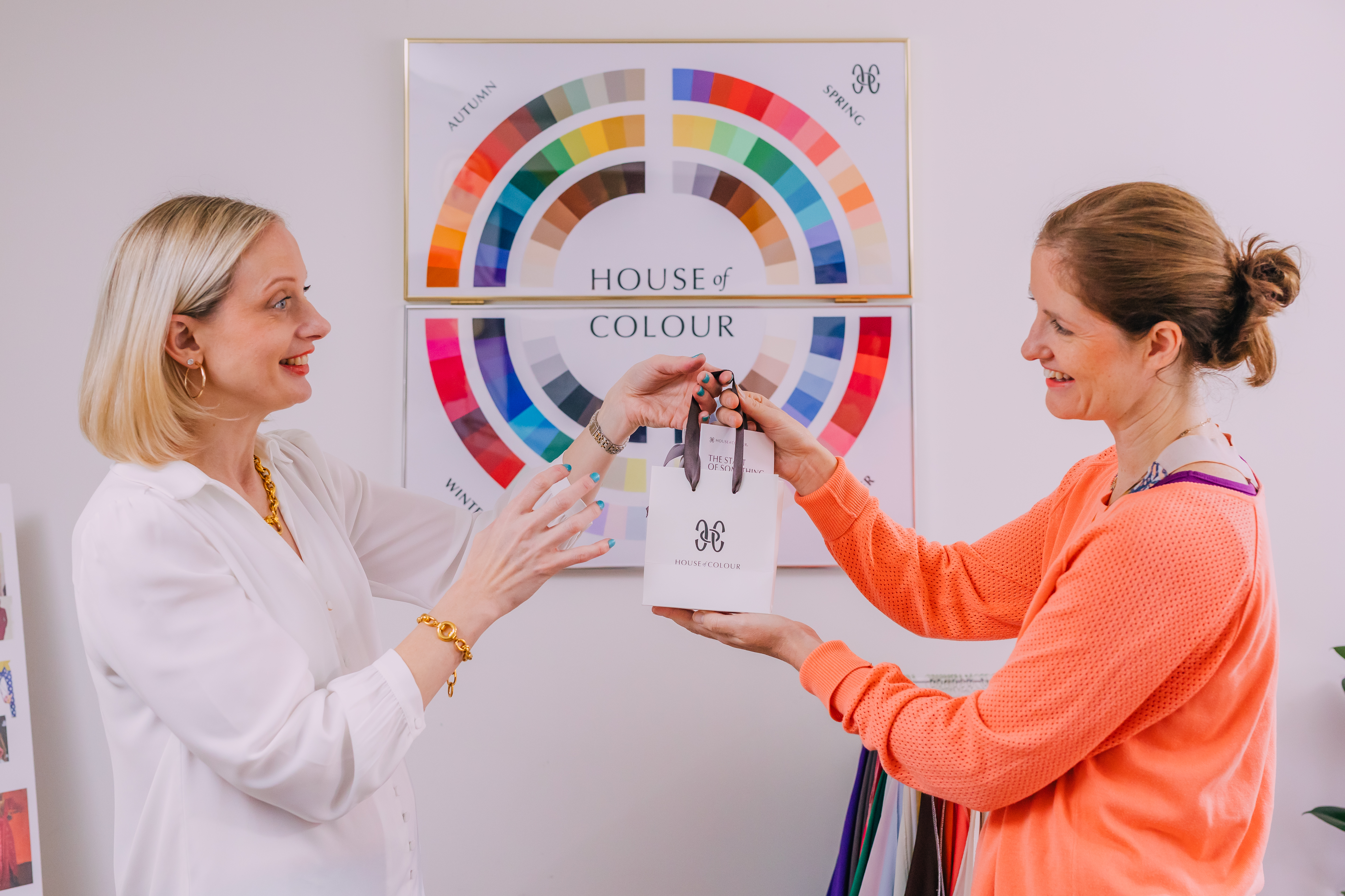 Brand handoff moment during a colour styling session