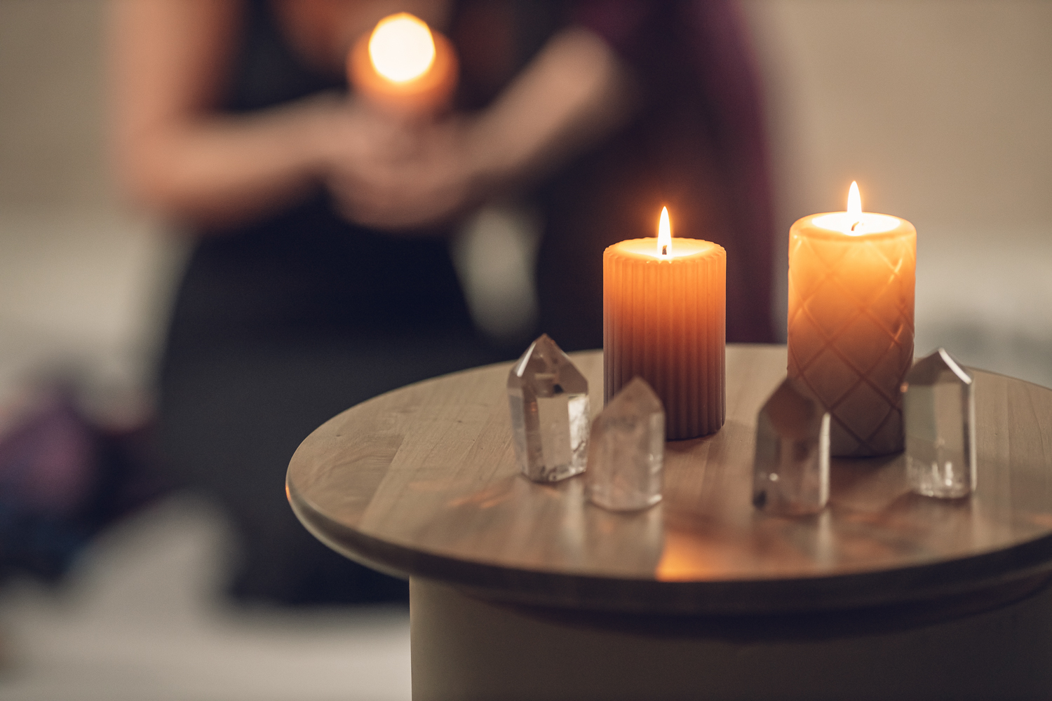 Candles and crystals styled for a holistic session
