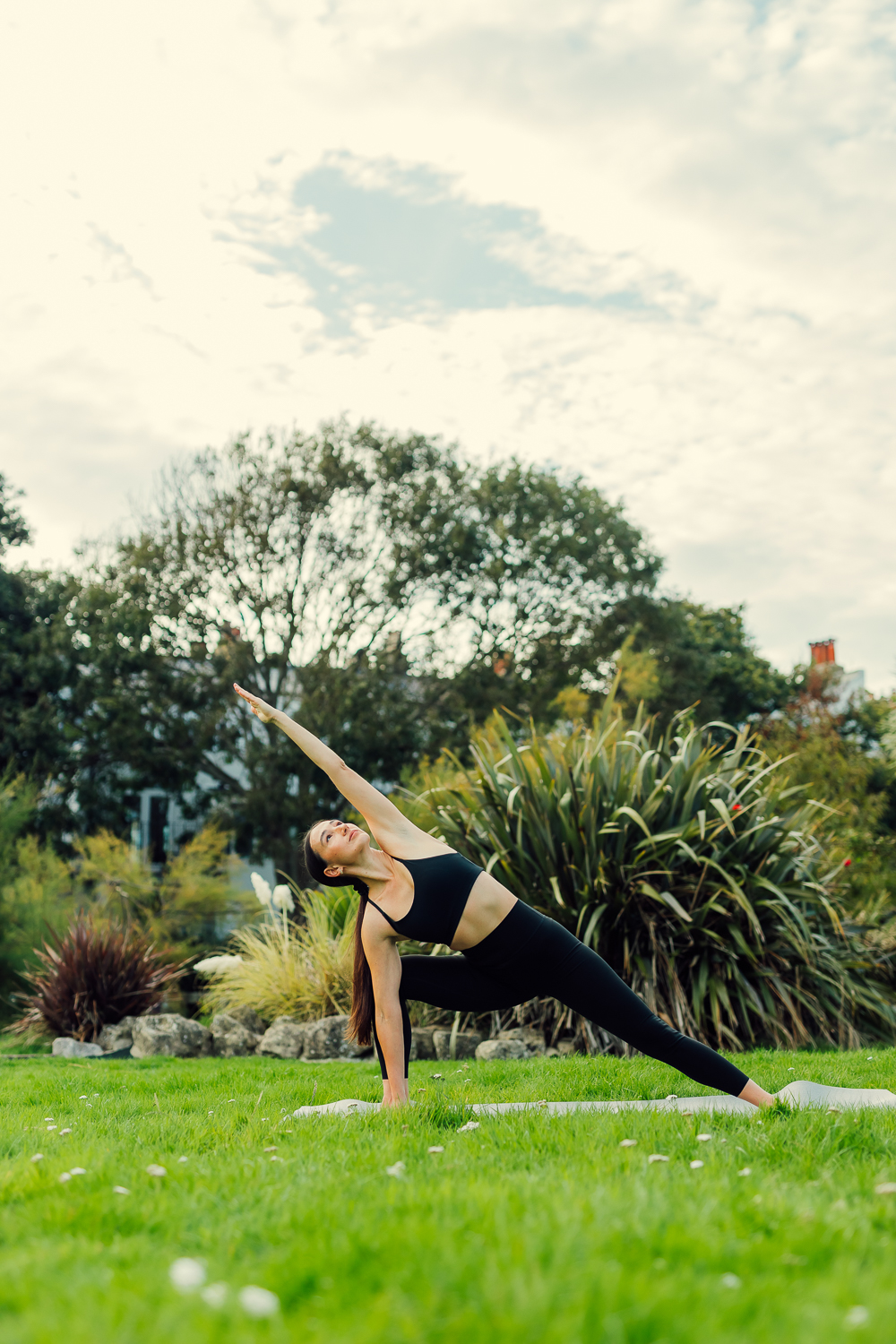 Vertical fitness portrait photographed with strong natural presence