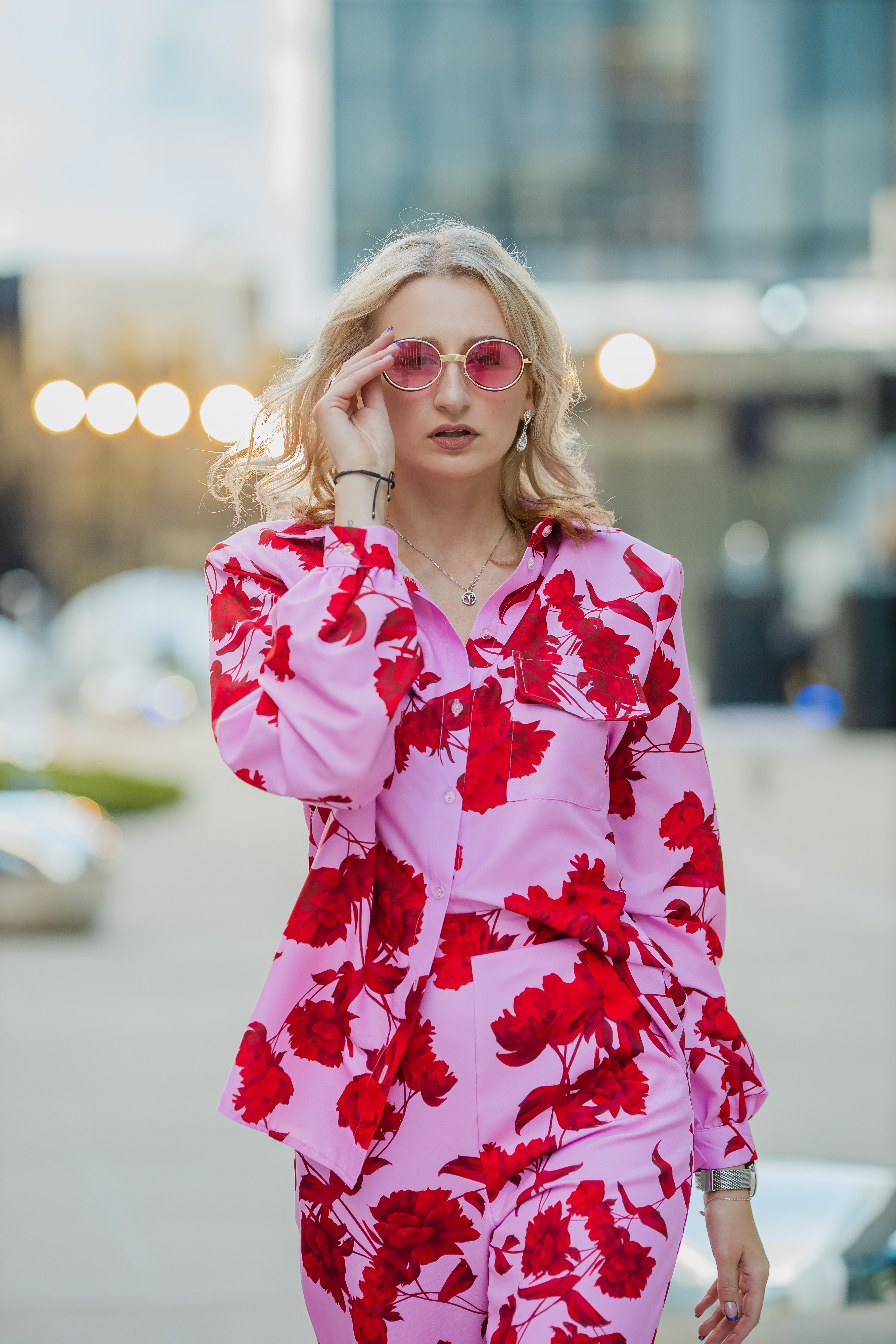 Statement fashion portrait in a tailored pink suit