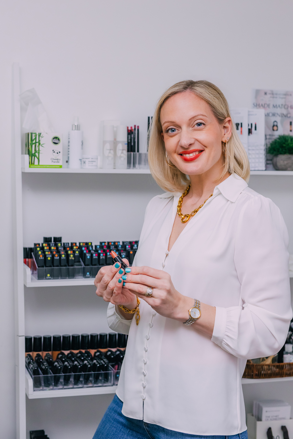 Brand portrait in a beauty studio with product shelves