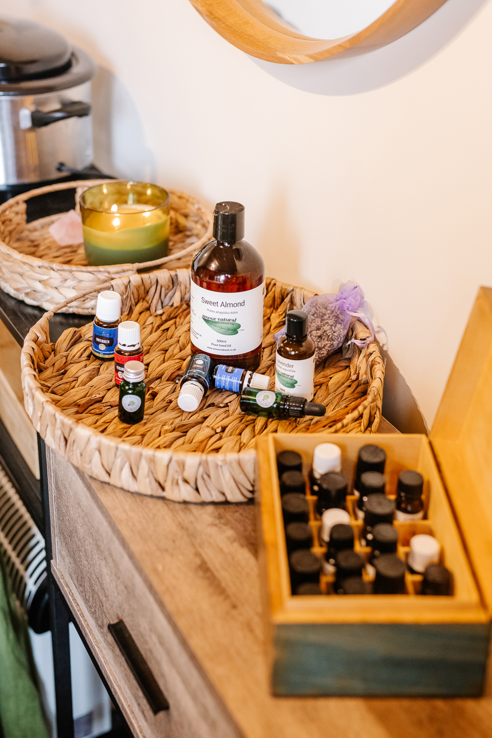 Styled tray of oils and bottles in a treatment room